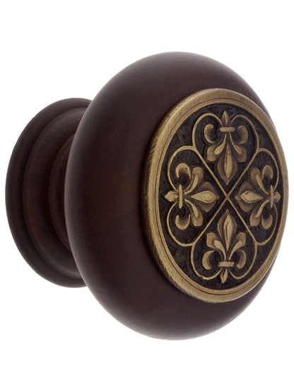 1 1/2 inch Diameter Fleur Dis Lis Knob in Dark Walnut/Antique Brass.
